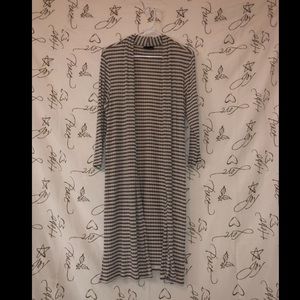 A cardigan being sold for $7.00